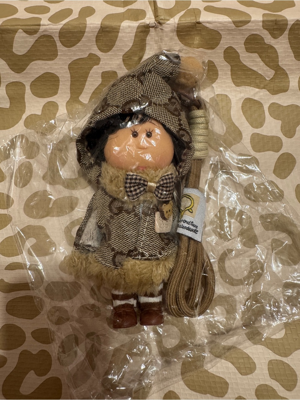 Brown Patterned Doll Keychain with Fur Trim